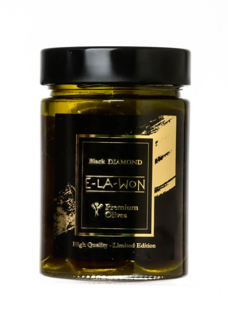 Indulge in the rich taste of E-LA-WON Black Diamond Olives - extra jumbo, low salt content, soaked in apple cider vinegar, and packed in Extra Virgin Olive Oil. A gourmet treat!
