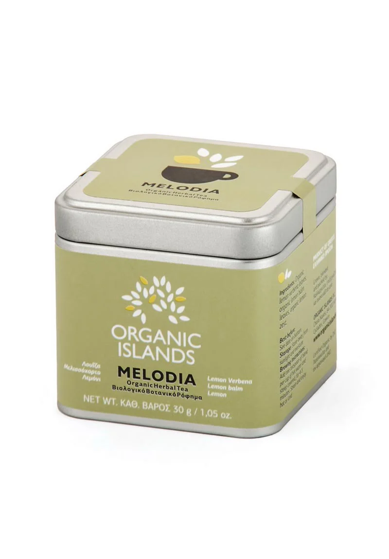 Bild von Organic Islands Melodia in einem Behälter. Der Behälter ist mit einer leuchtenden Mischung aus getrockneten Zitronenverbenenblättern, Zitronenmelissenblättern und Zitronenschale gefüllt.