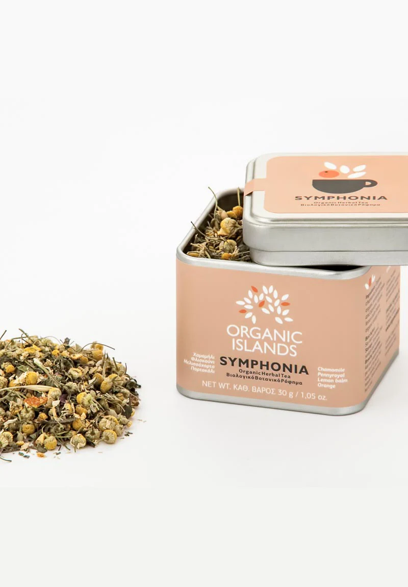 Image of Organic Islands Symphonia herbal tea blend (30g).The container is filled with a colorful mix of dried chamomile flowers, pennyroyal leaves and flowers, lemon balm leaves, and orange peel.