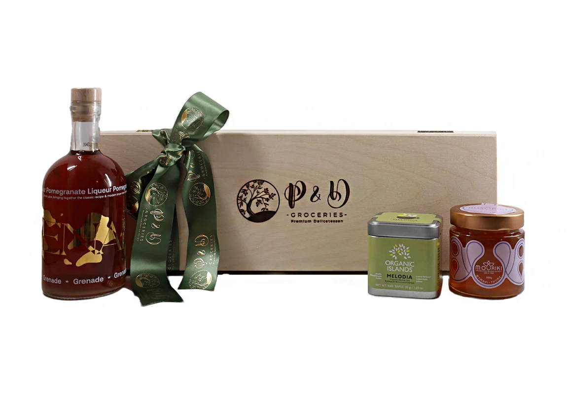 "Elegant wooden gift box with Pomegranate Liqueur, Thyme Honey, and Organic Tea."