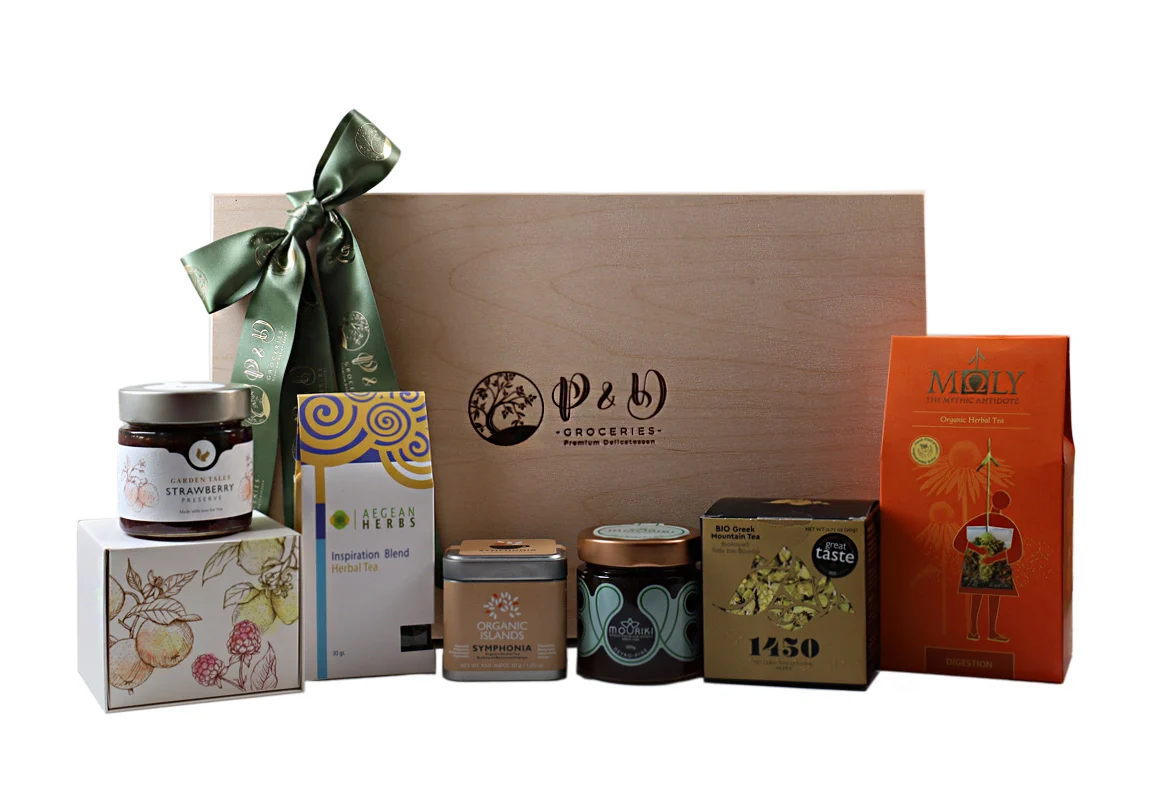 Holzgeschenkbox mit hochwertigen Bio-Tees, Honig und Marmeladen – ein Symbol für Luxus und Professionalität.